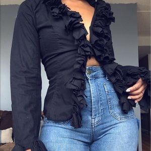 Black ruffled blouse